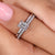 Emerald cut solitaire ring featuring a timeless and elegant design
 Emerald cut solitaire ring featuring a timeless and elegant design