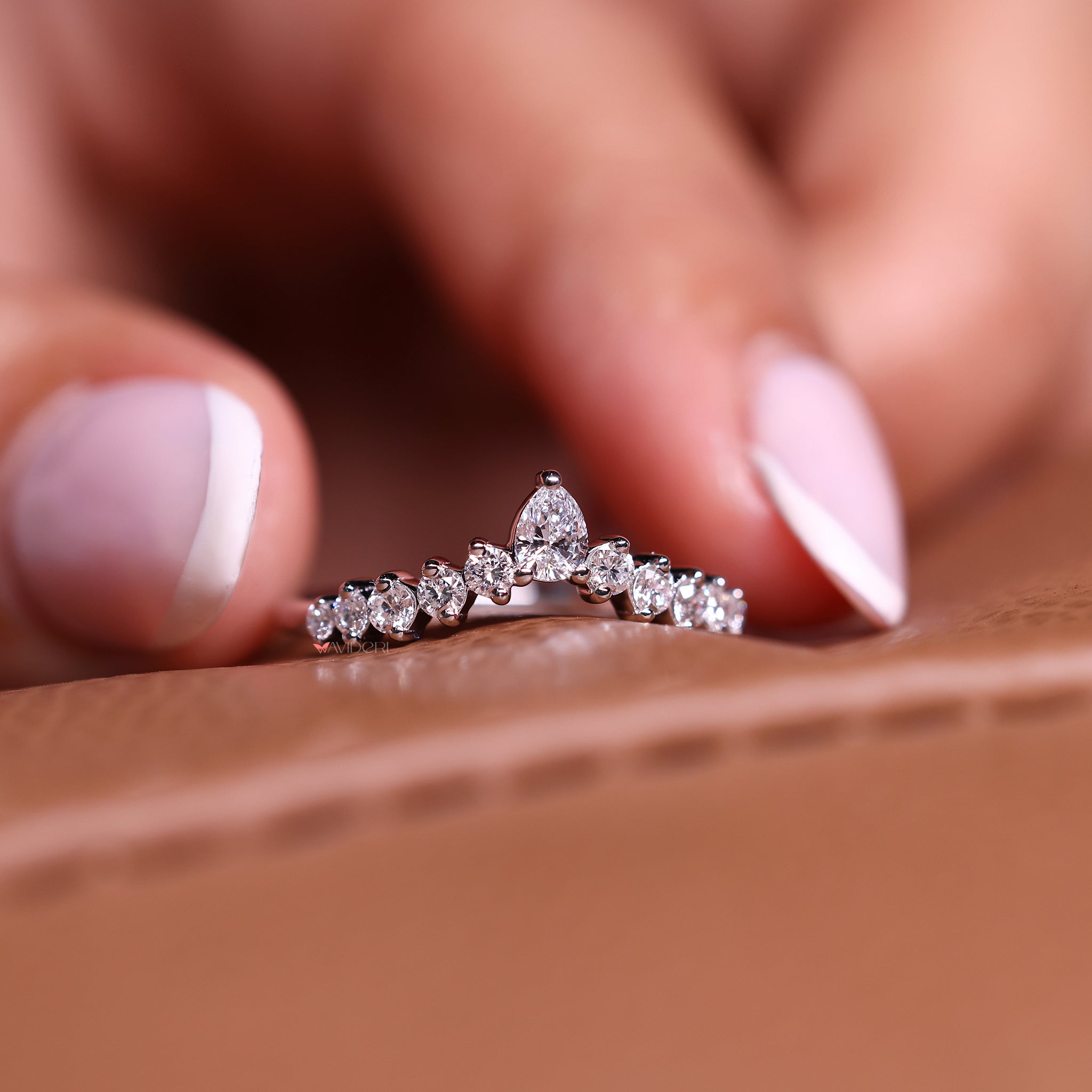 Prong set wedding band with secure and sparkling diamonds.