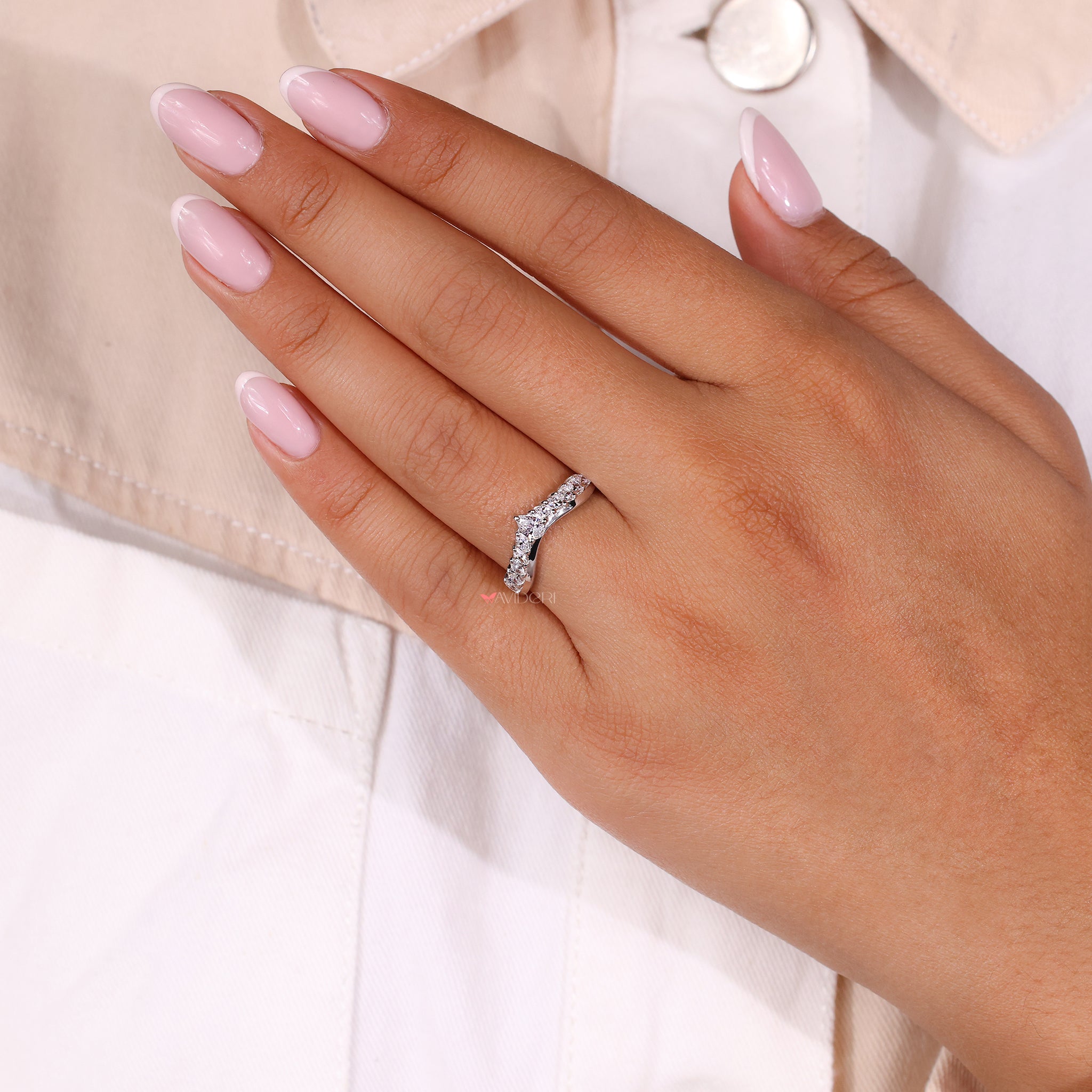 Prong setting band highlighting the diamonds perfectly.