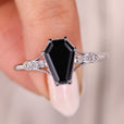 Black moissanite ring with a sleek, modern design for timeless elegance.