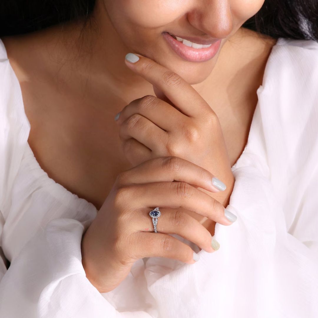 Moissanite engagement ring shines beautifully with split pave band.