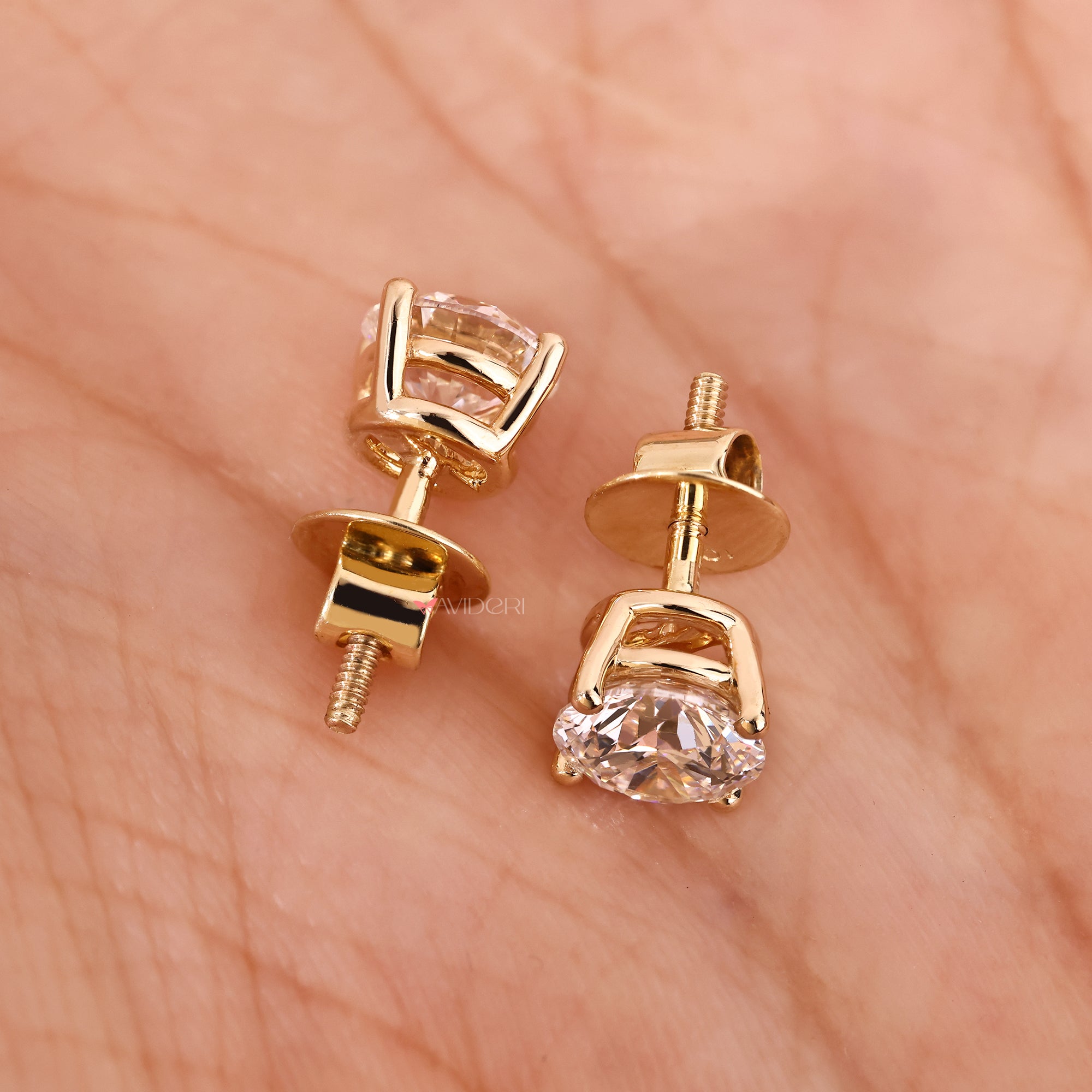 Yellow gold diamond stud earrings in 6mm size.