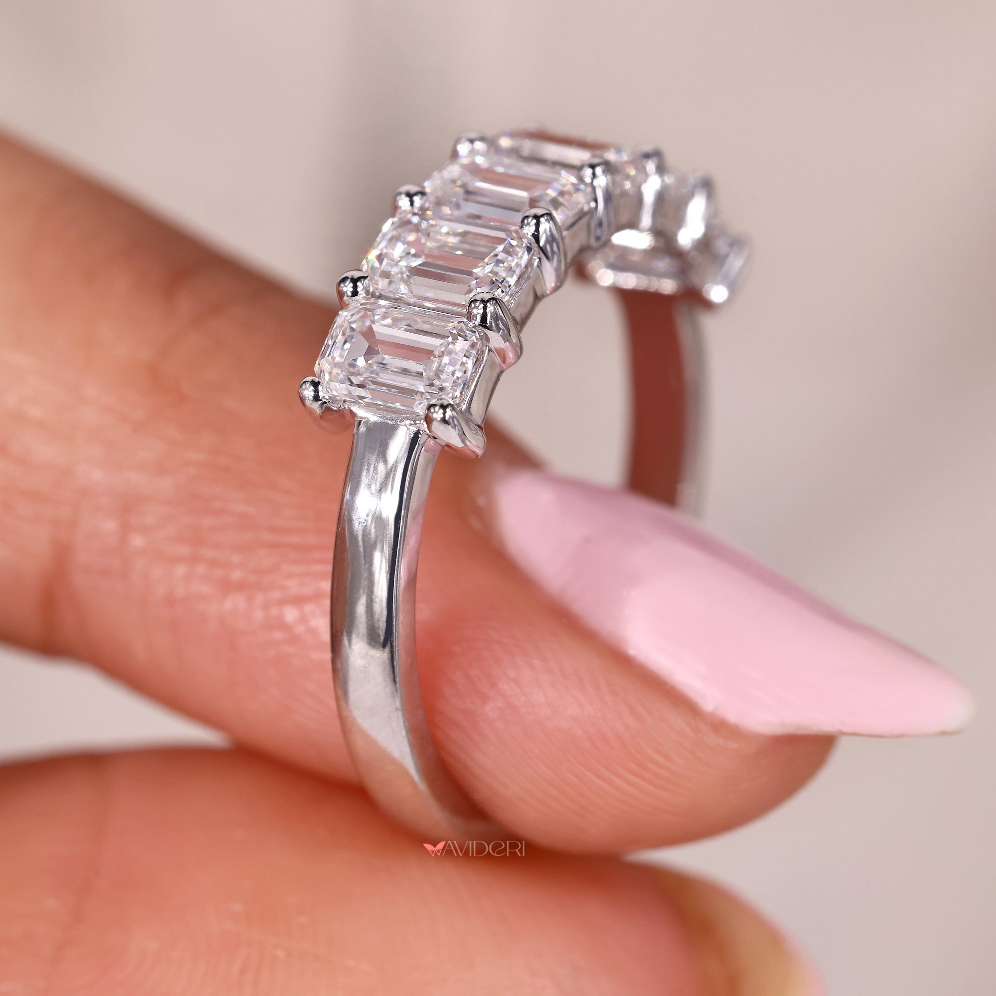 Shared prong wedding band crafted with lab grown diamonds.