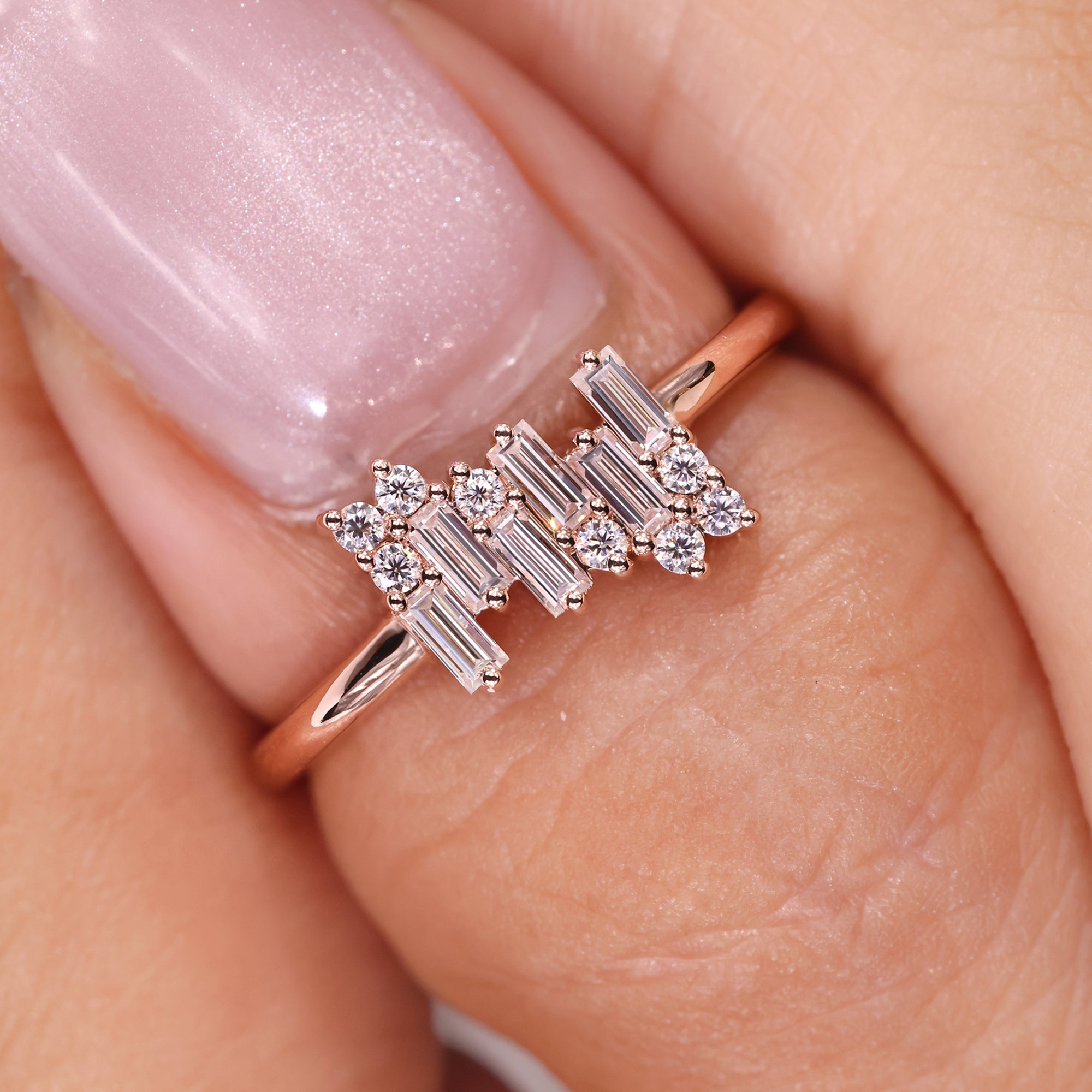 Baguette diamond engagement ring set in a classic prong setting, offering a sophisticated look.