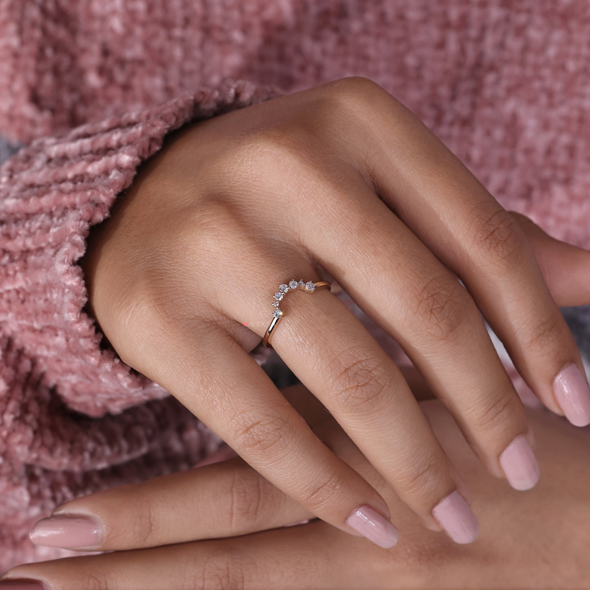 U-shape round diamond band in a beautiful setting.