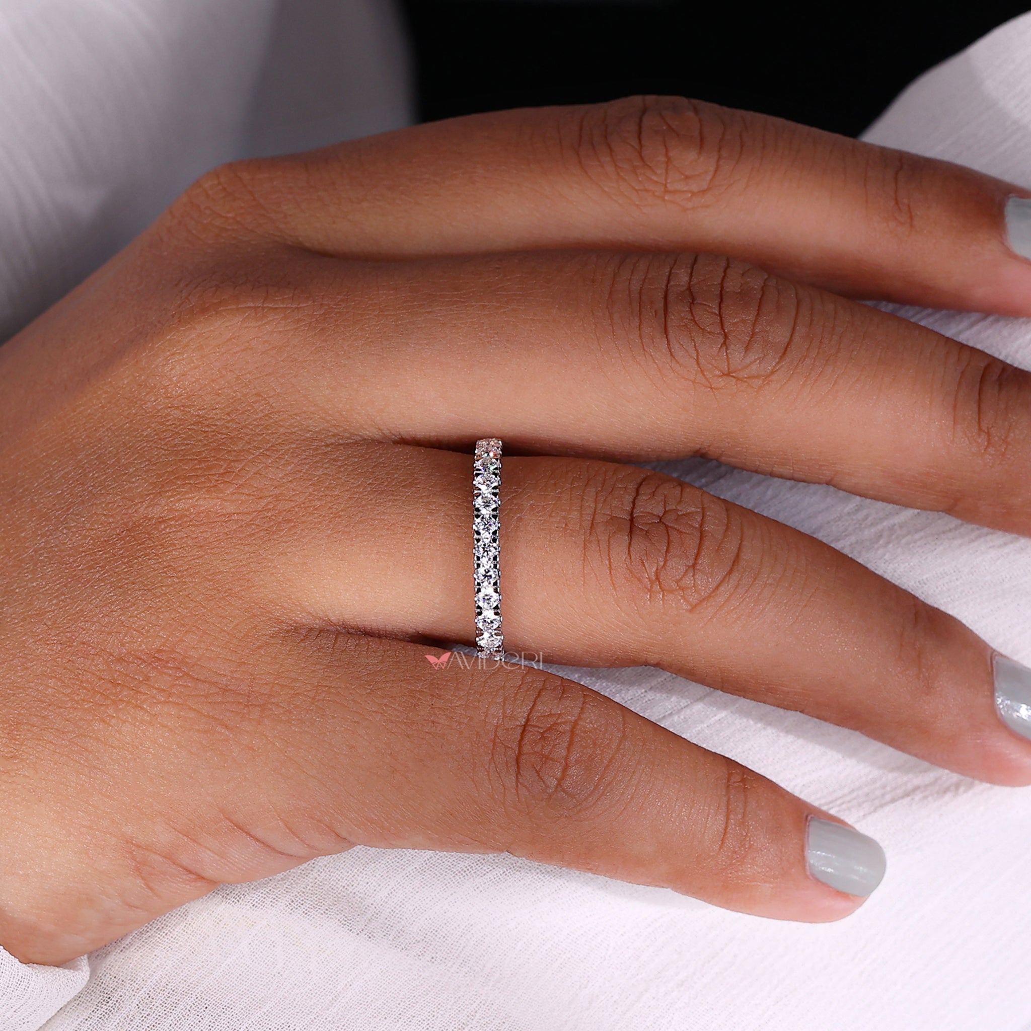 Sleek white gold band with smooth, polished finish.