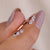 Open gap wedding band with modern design in rose gold.
 Open gap wedding band with modern design in rose gold.
