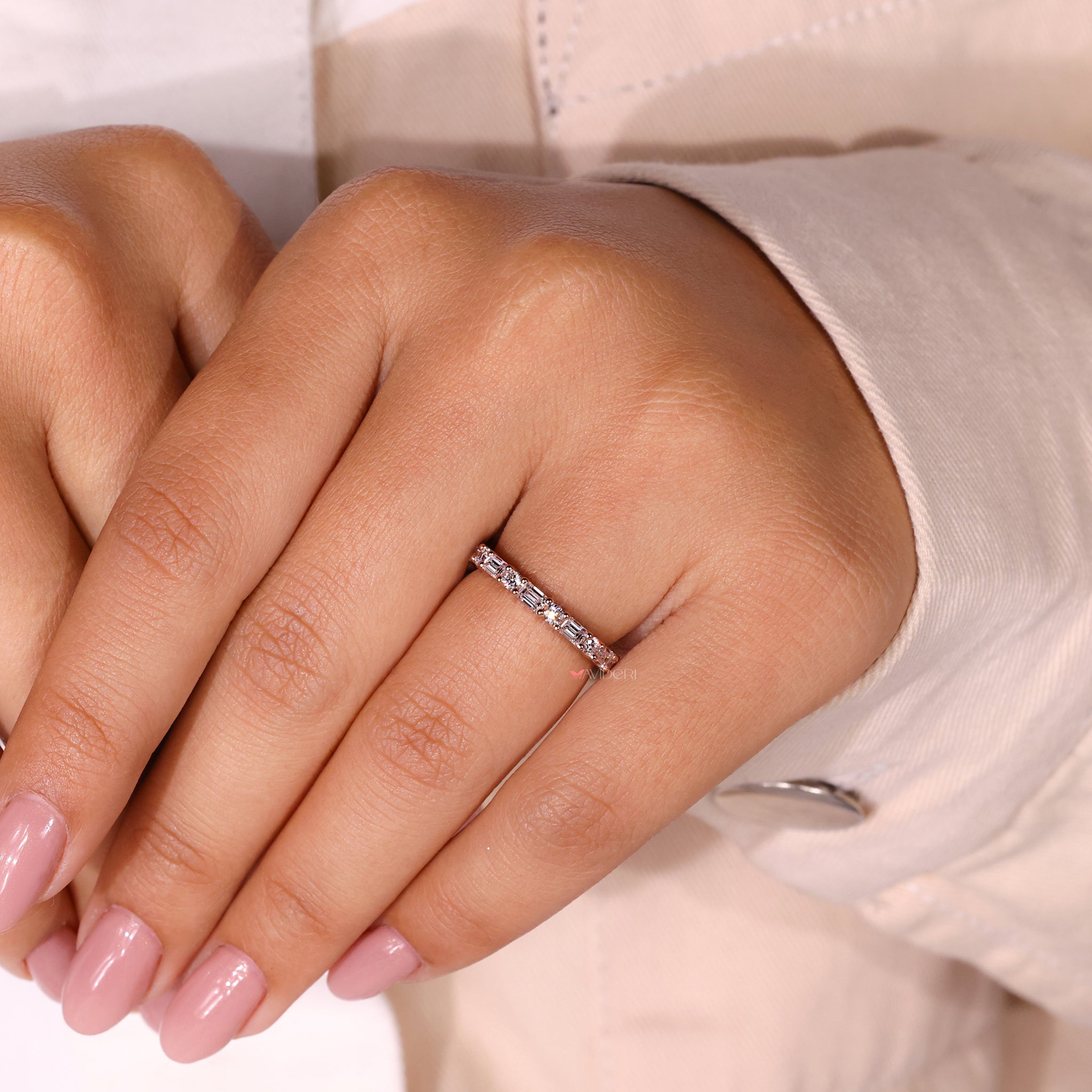 Classic eternity band with round diamonds for timeless style.