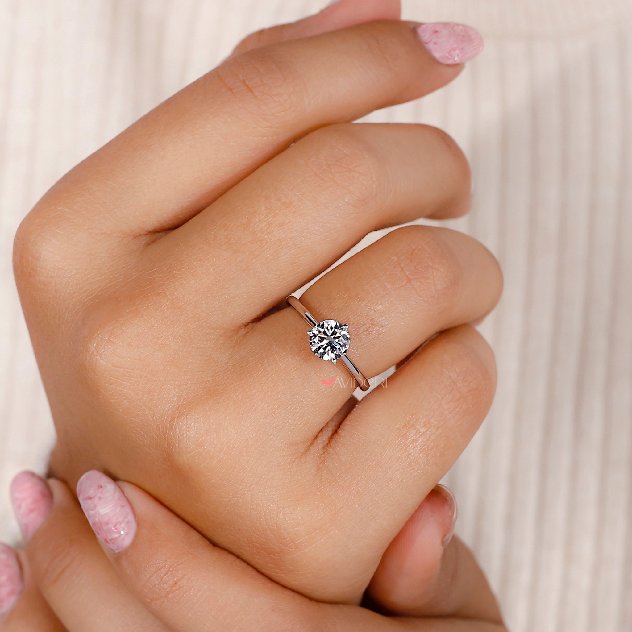 Round diamond solitaire ring crafted with care, offering a brilliant centerpiece for engagements or special occasions.