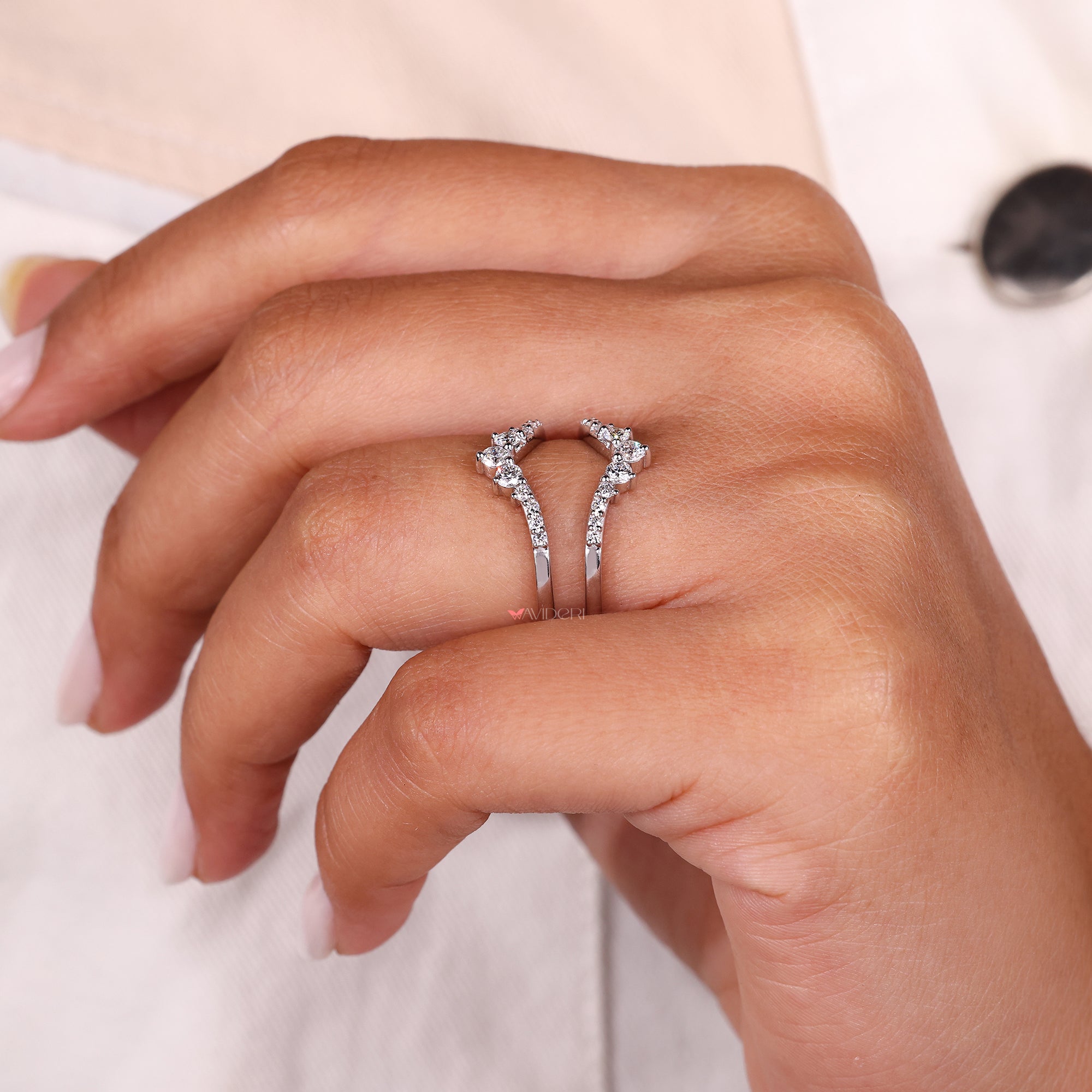 Shared prong wedding band in a curvy guard style.