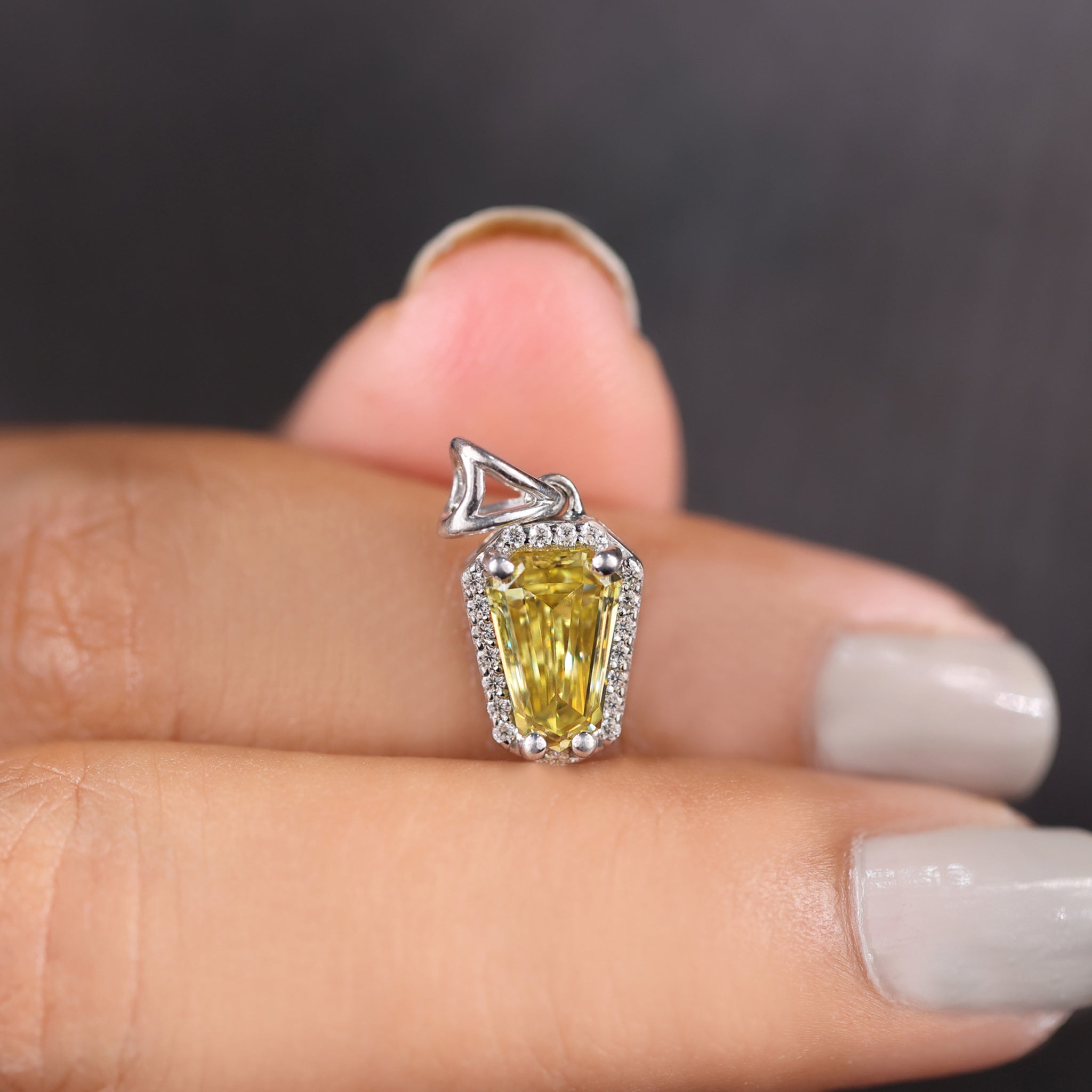 Round cut halo pendant adds extra shine to jewelry collections.