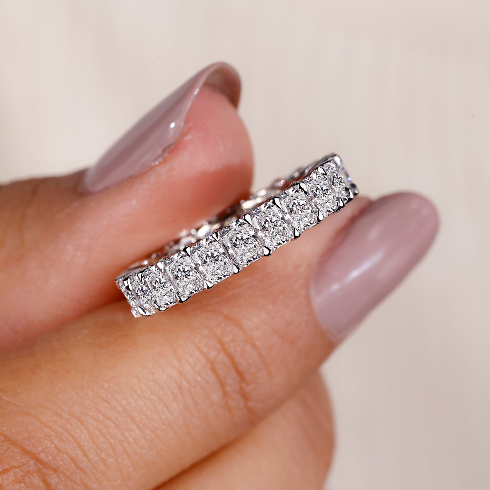 Radiant diamond wedding band with elegant design and sparkling diamonds.