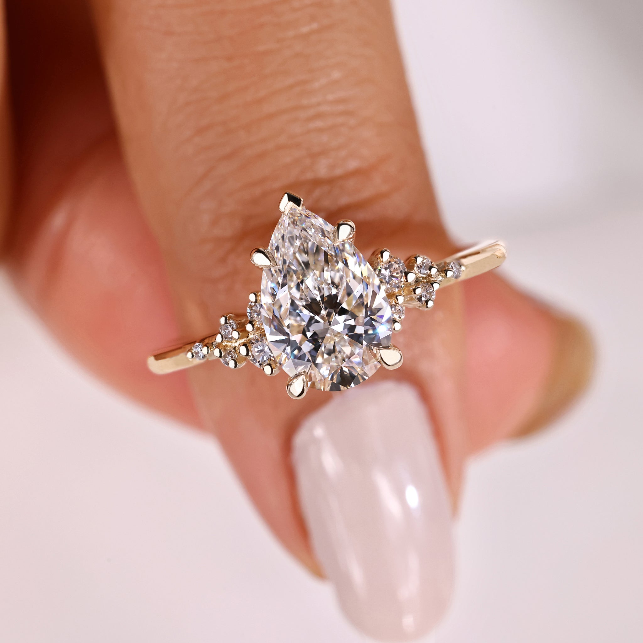 Pear shaped ring with a snowdrift ring design.