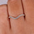 Curved diamond wedding band with sleek design and brilliant diamonds.
 Curved diamond wedding band with sleek design and brilliant diamonds.