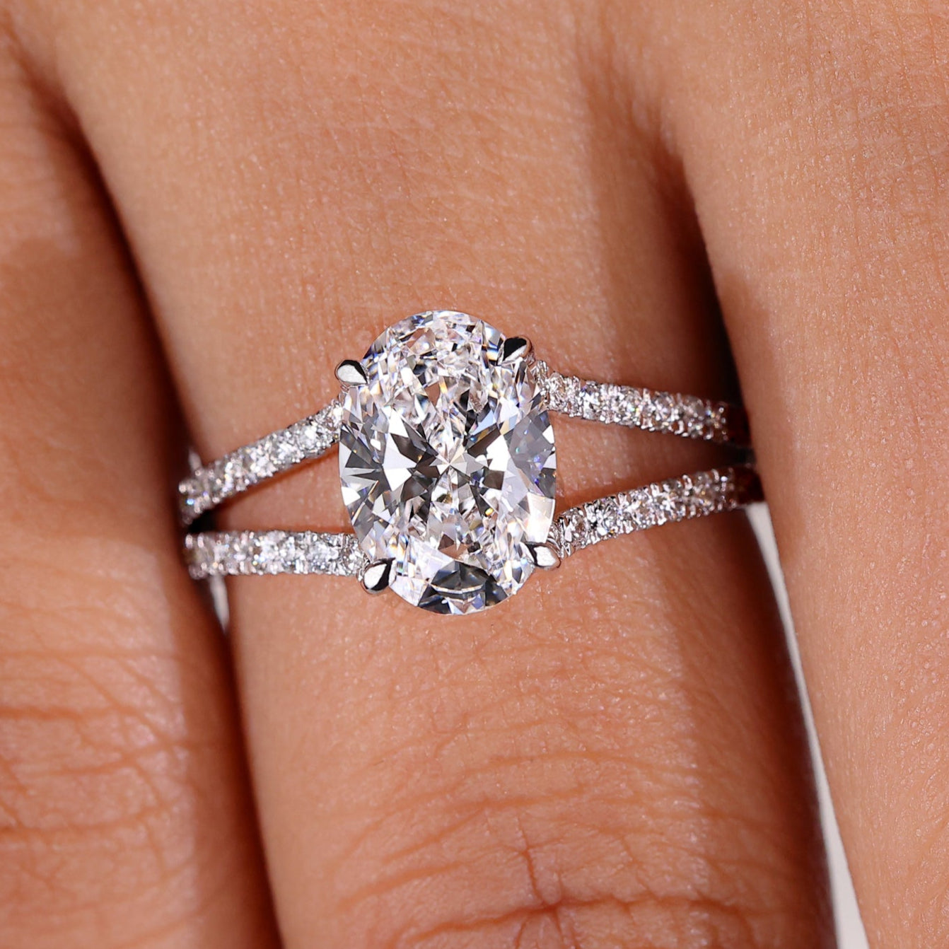 Elegant oval diamond engagement ring showcasing timeless craftsmanship and unmatched brilliance.