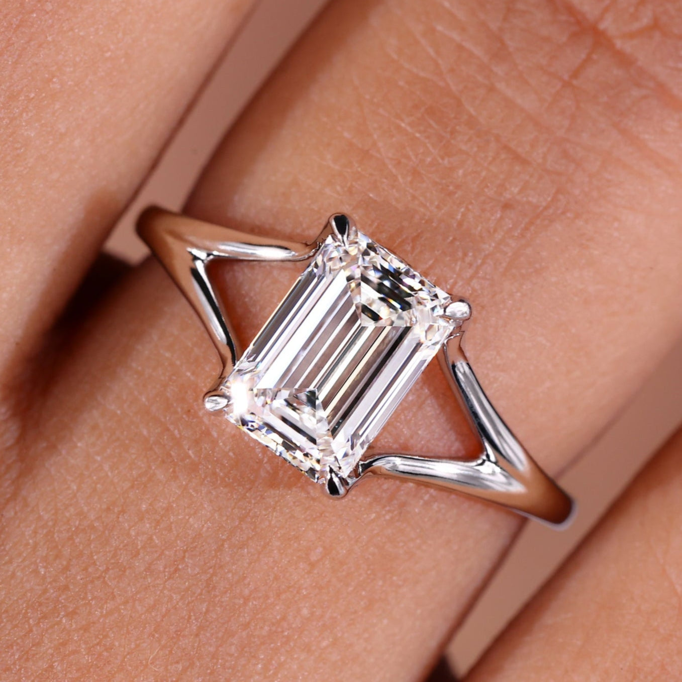 Emerald Cut Solitaire Ring featuring a Lab Grown Diamond with a split shank engagement ring design for timeless elegance.