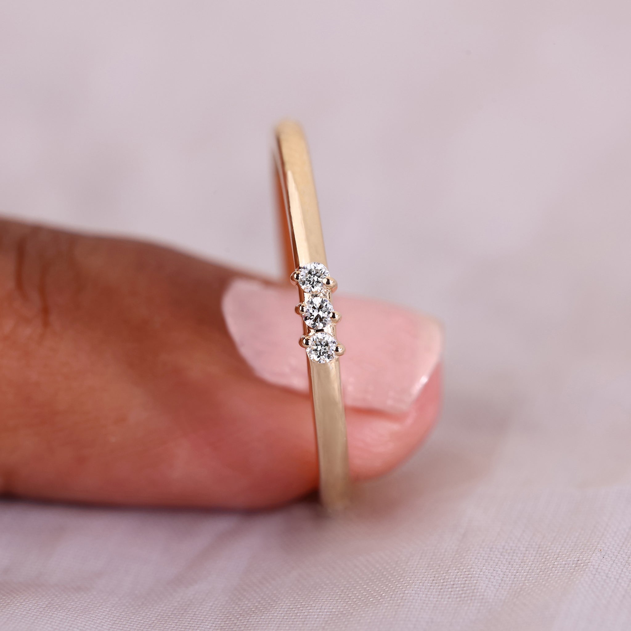 3 stone diamond wedding band with sparkling diamonds.