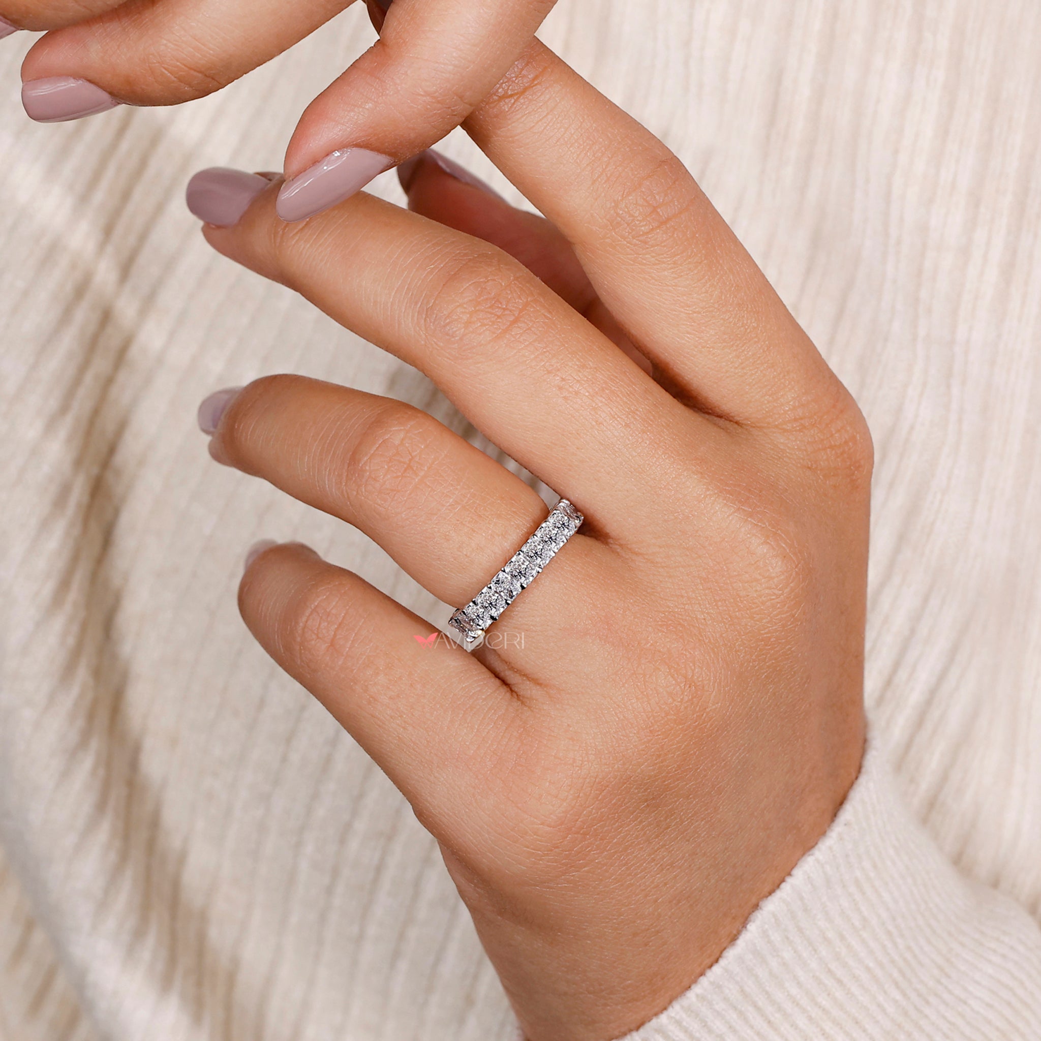 Claw Prong Setting holding diamonds securely in a brilliant display.