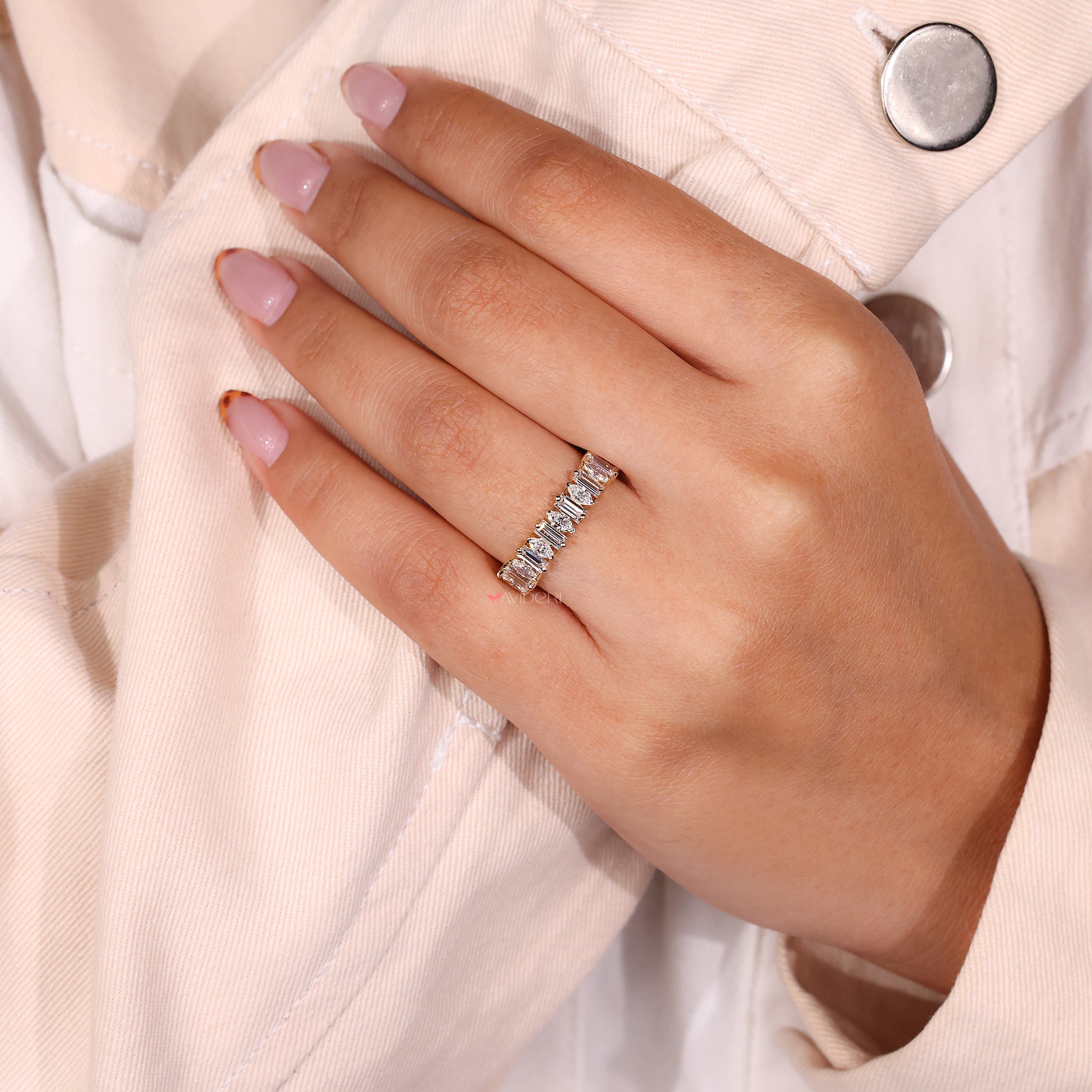 Baguette diamond band with a sleek tapered shank.