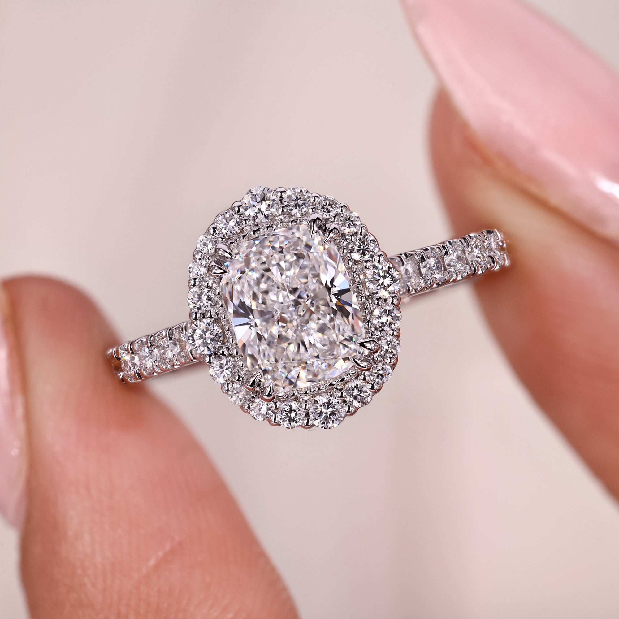 Milgrain setting with white gold engagement ring.