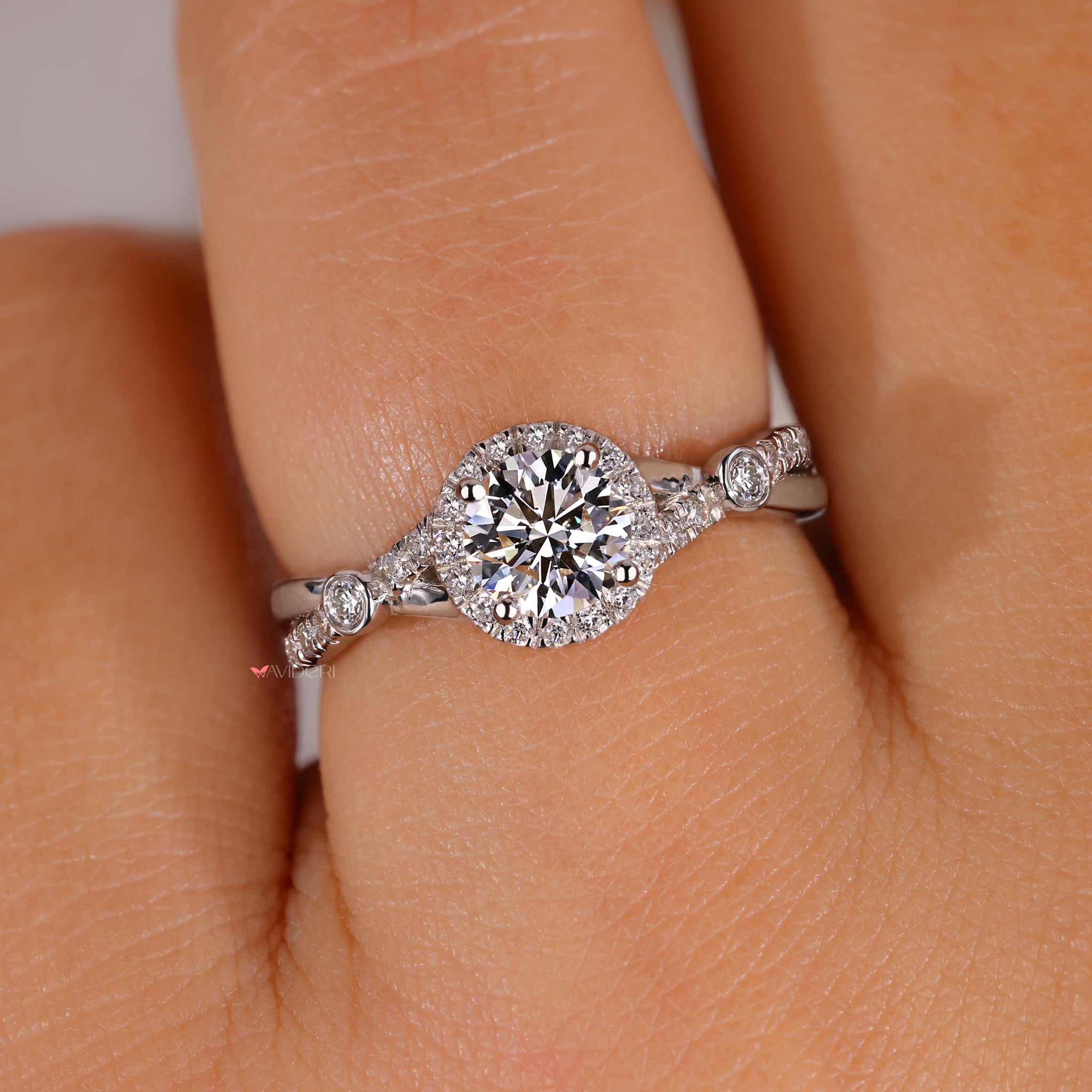 Twist engagement ring with a handmade ring.