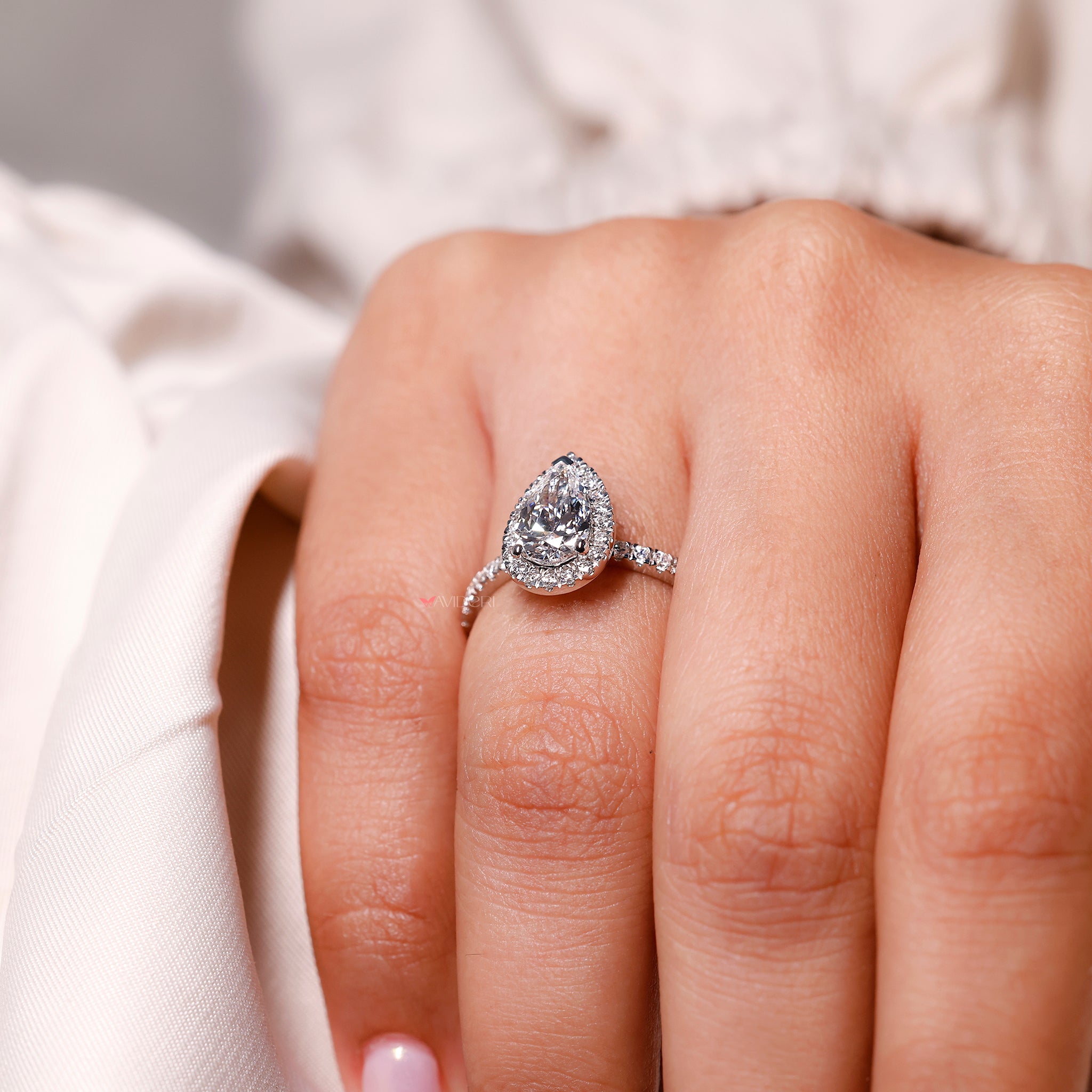 Avideri engagement ring with lab grown round diamond.
