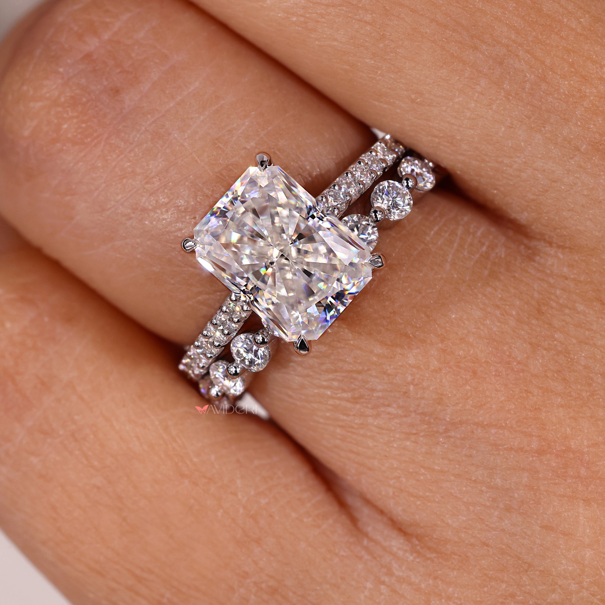 Handmade jewelry featuring radiant engagement and eternity band.