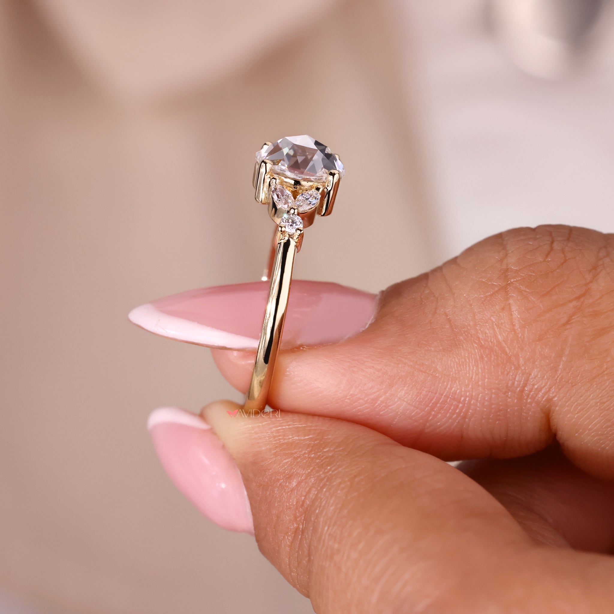 Gold yellow ring with a rose cut diamond for a luxurious finish.