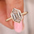 Hexagon cut engagement ring with bezel setting in yellow gold. Hexagon cut engagement ring with bezel setting in yellow gold.