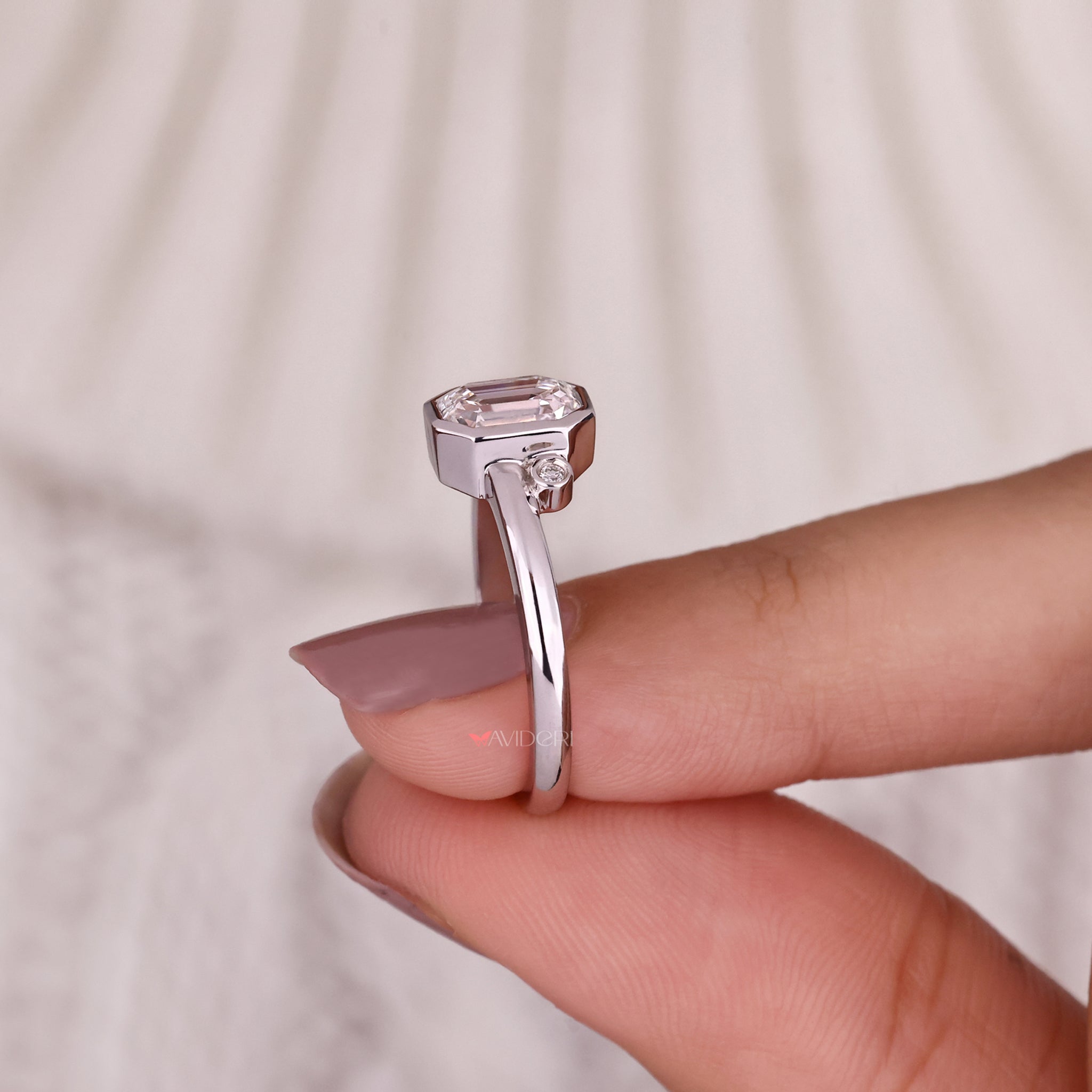Classic gold emerald cut engagement ring for a timeless look.