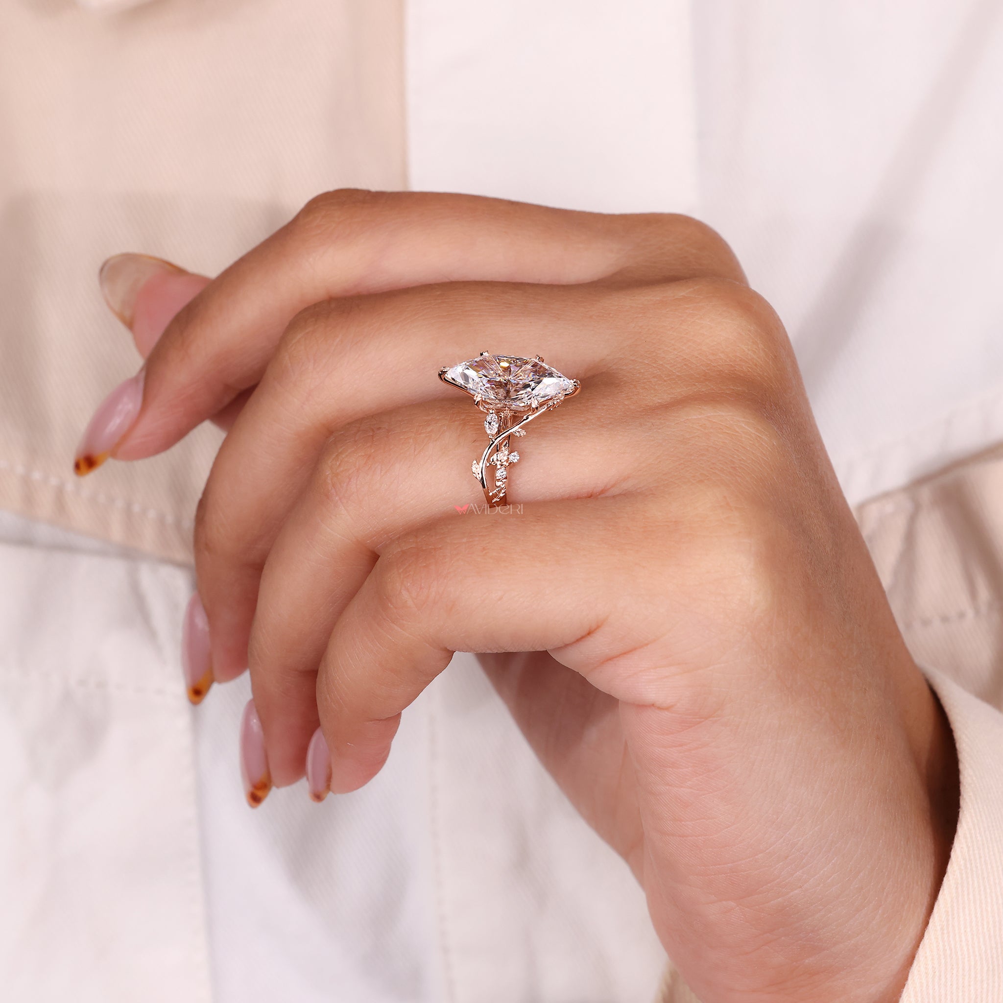 Proposal ring with leaf and vine engagement ring design and IGI certified Lab Grown Diamond.