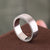 White gold men's wedding band with a round diamond wedding band design.
 White gold men's wedding band with a round diamond wedding band design.