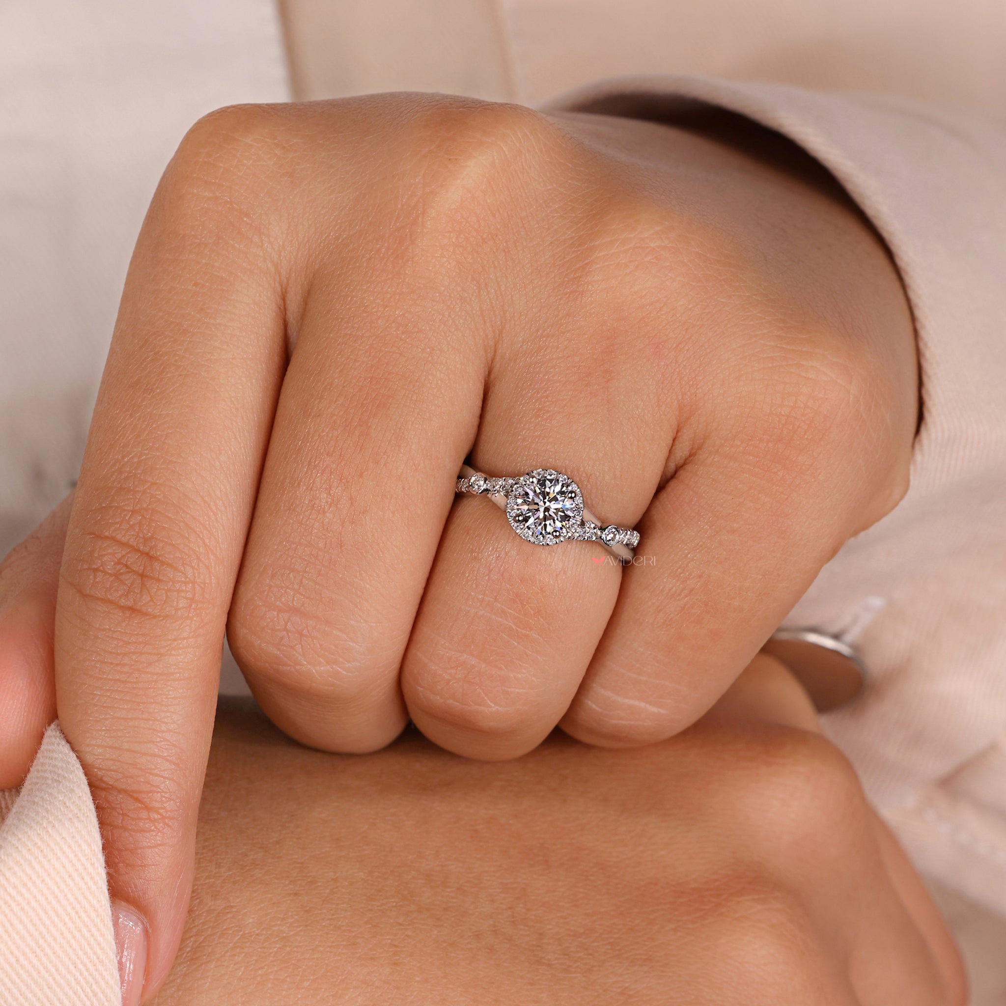 Twist ring with a bridge accent engagement ring.