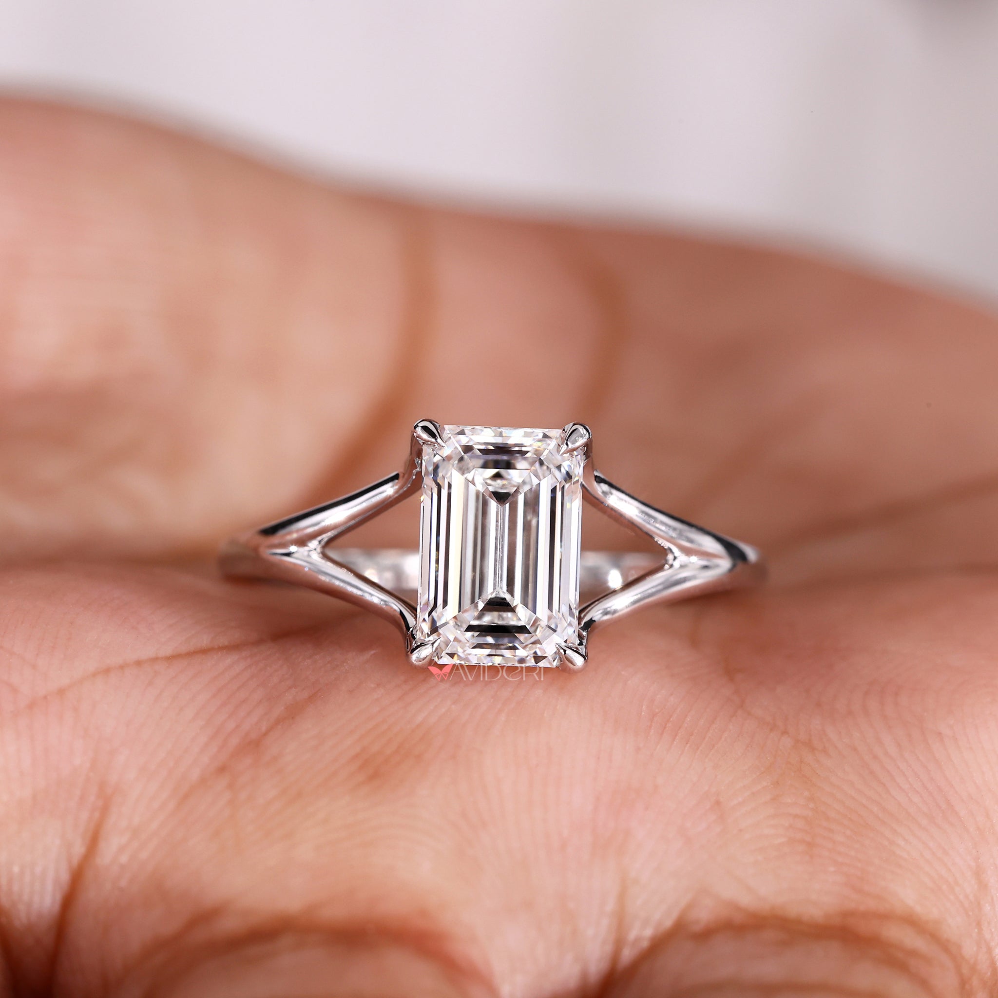 Solitaire Emerald Cut Ring highlighting a diamond solitaire ring with intricate handmade jewelry craftsmanship for a unique finish.