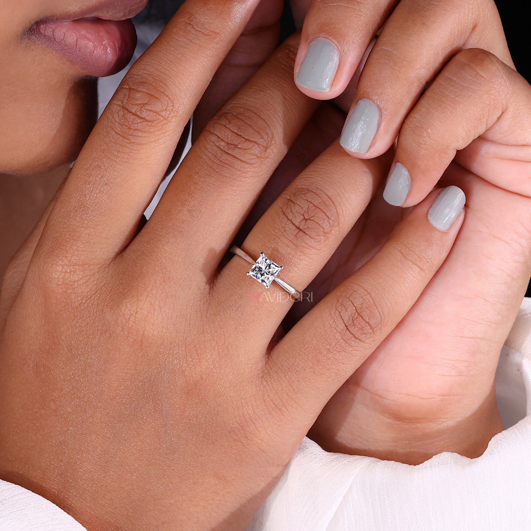 cathedral setting tapered shank engagement ring