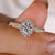 A stunning round diamond engagement ring with timeless elegance.
 A stunning round diamond engagement ring with timeless elegance.