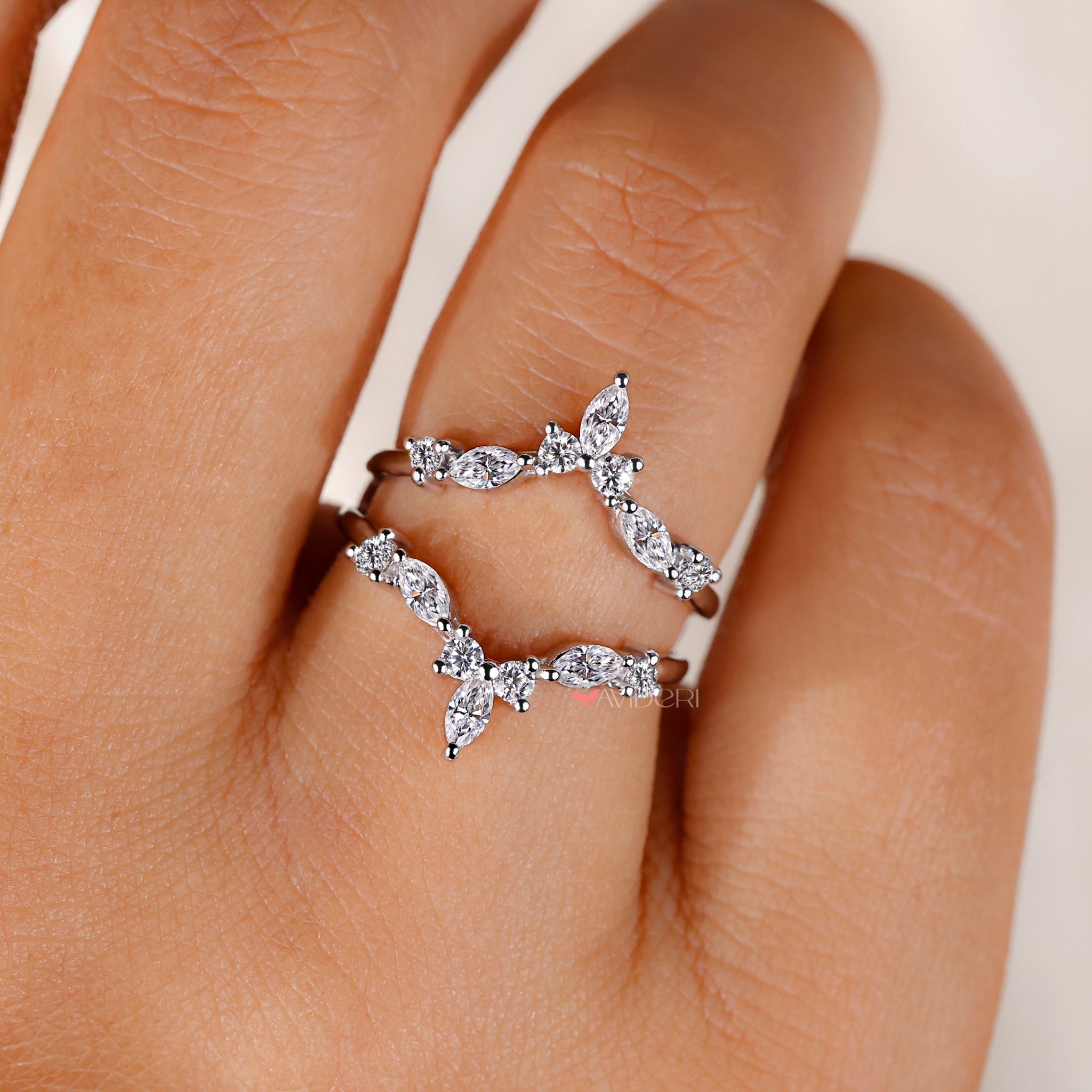 Prong setting wedding band with secure design.