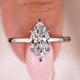 Marquise ring featuring a solitaire diamond centerpiece.