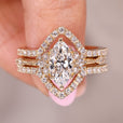 Marquise engagement ring with wedding band in cluster engagement ring.