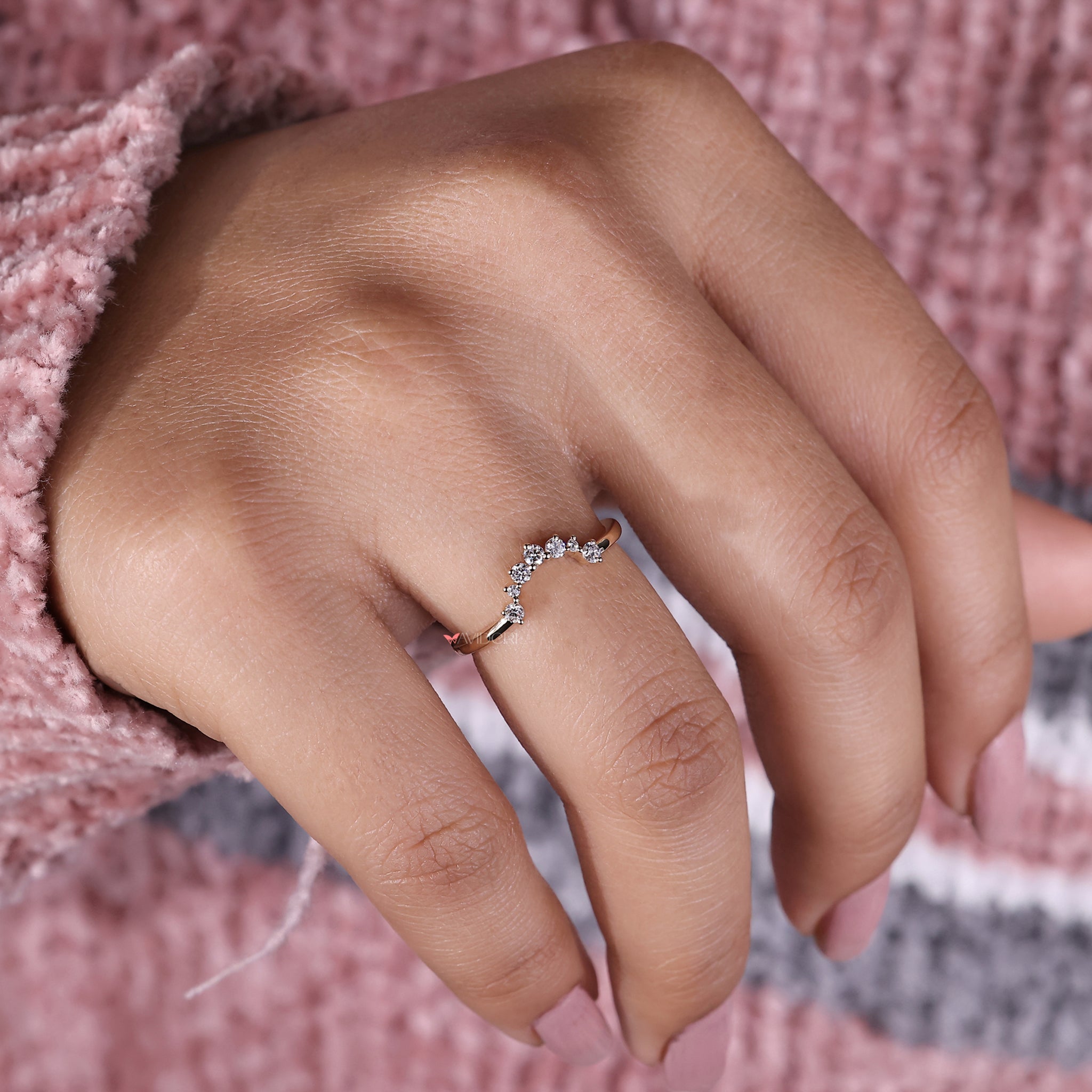 Yellow gold round diamond band with a smooth finish.