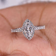 Marquise halo engagement ring featuring a sparkling diamond set in a classic halo design with exquisite craftsmanship.