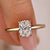 A cushion cut diamond ring in a classic prong setting, showcasing its brilliance.
 A cushion cut diamond ring in a classic prong setting, showcasing its brilliance.
