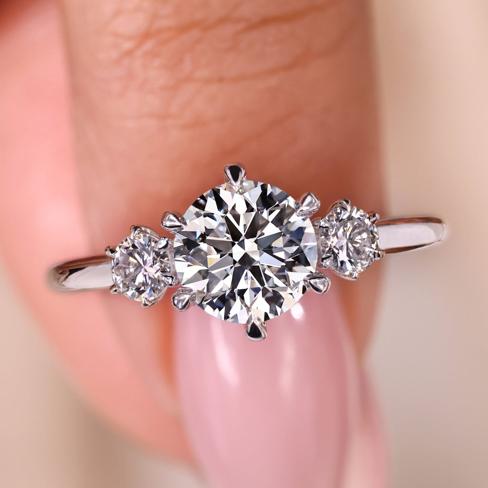 Elegant 3 stone diamond ring showcasing timeless beauty and sparkle.