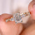 Stunning emerald cut diamond ring showcasing timeless elegance.
 Stunning emerald cut diamond ring showcasing timeless elegance.