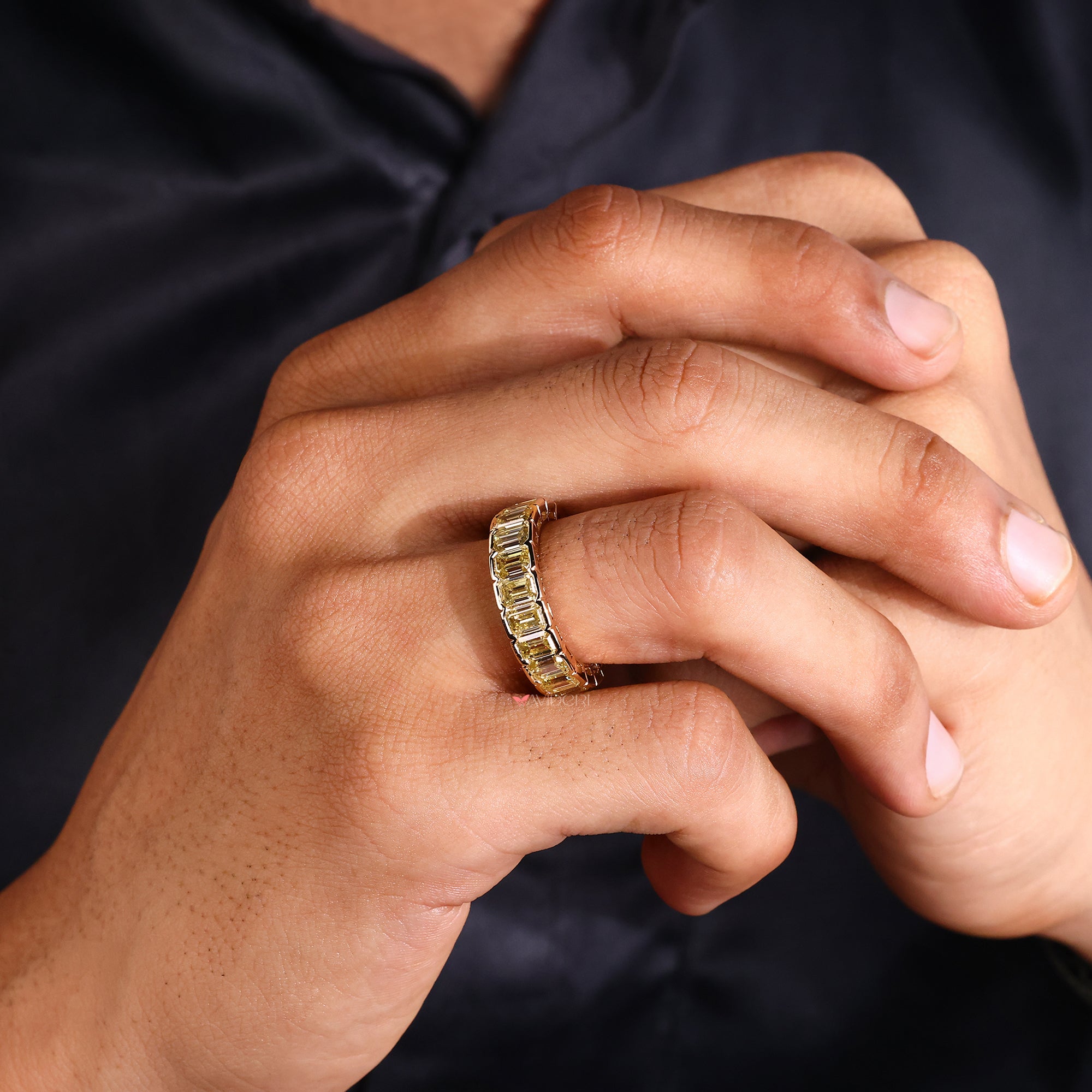 Moissanite wedding ring in mens ring.