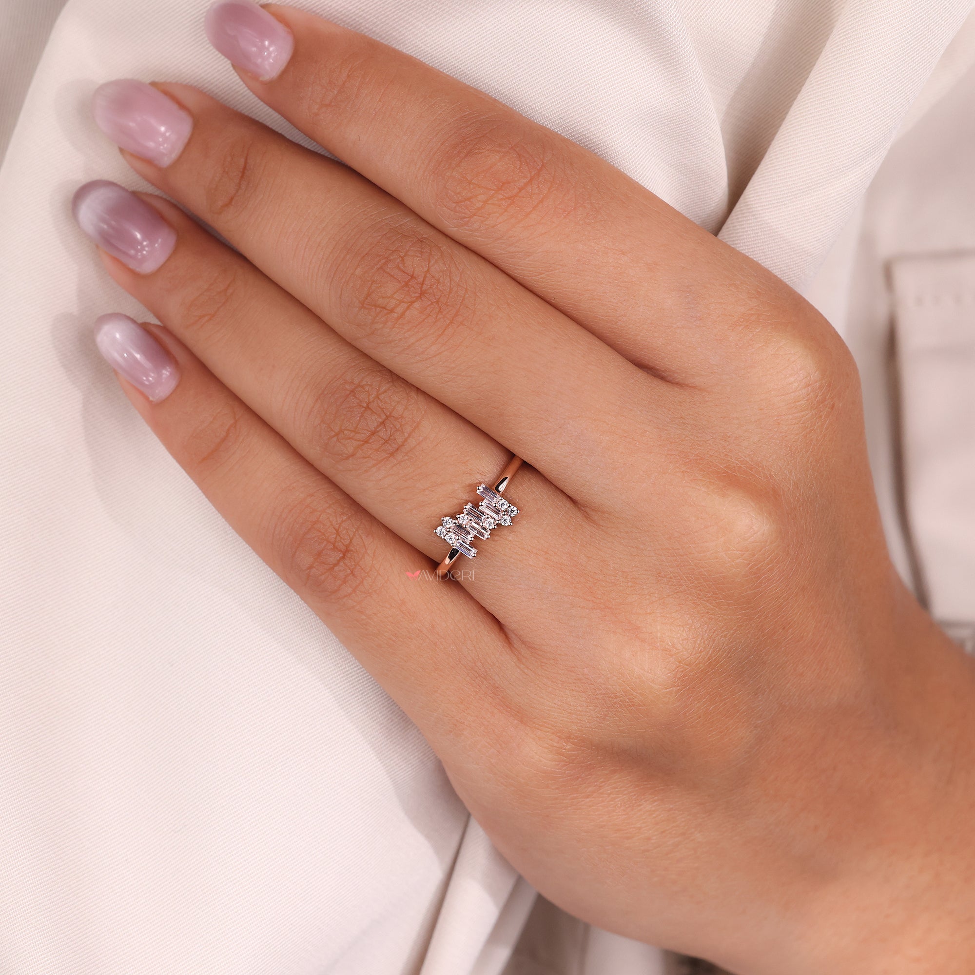 Zig zag engagement ring featuring baguette diamonds, offering a bold, modern design.