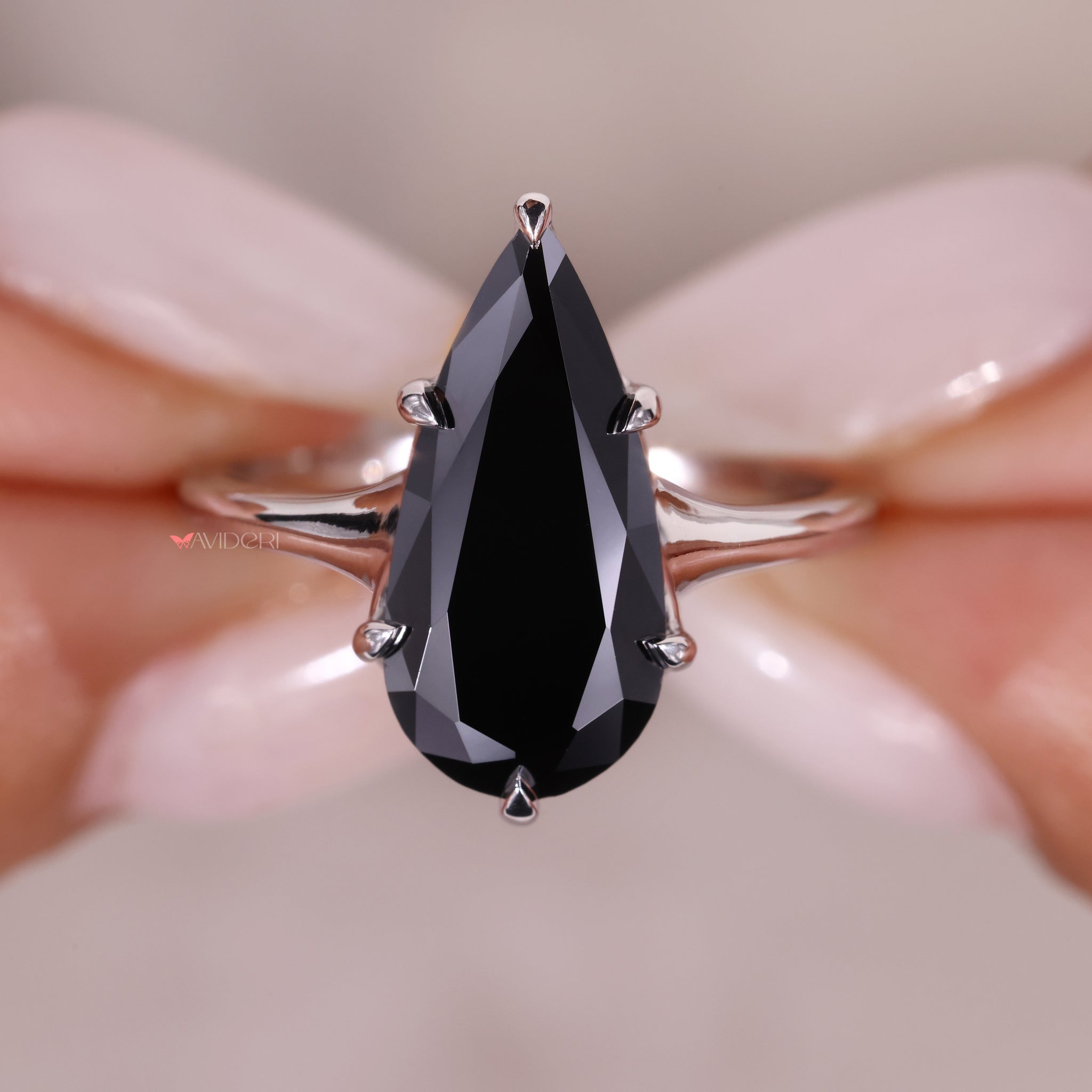 Solitaire Engagement Ring with a flawless pear-cut diamond.