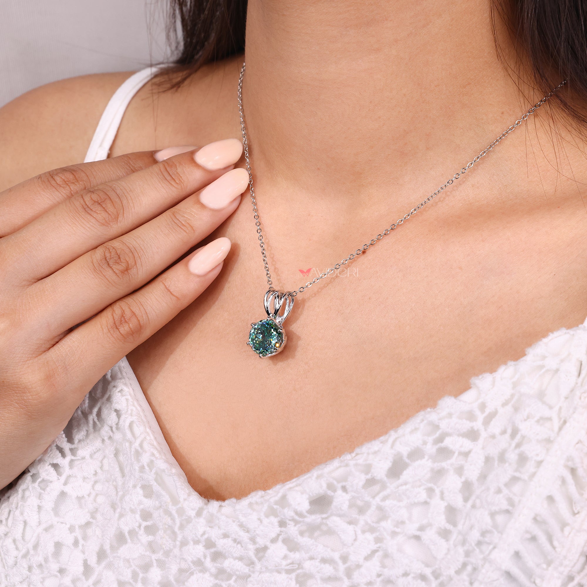 Handmade jewelry featuring a smooth white gold finish.