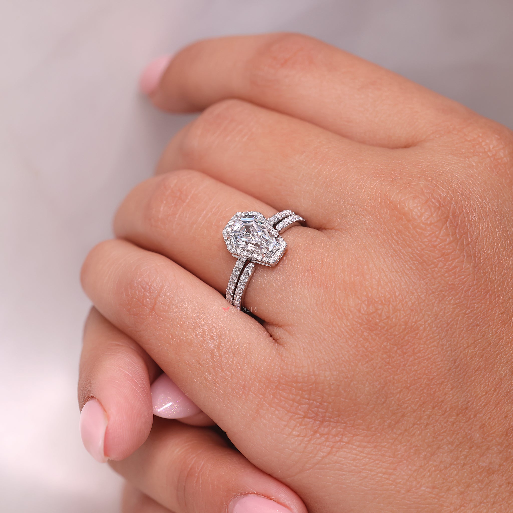 Half eternity diamond band with side diamonds.