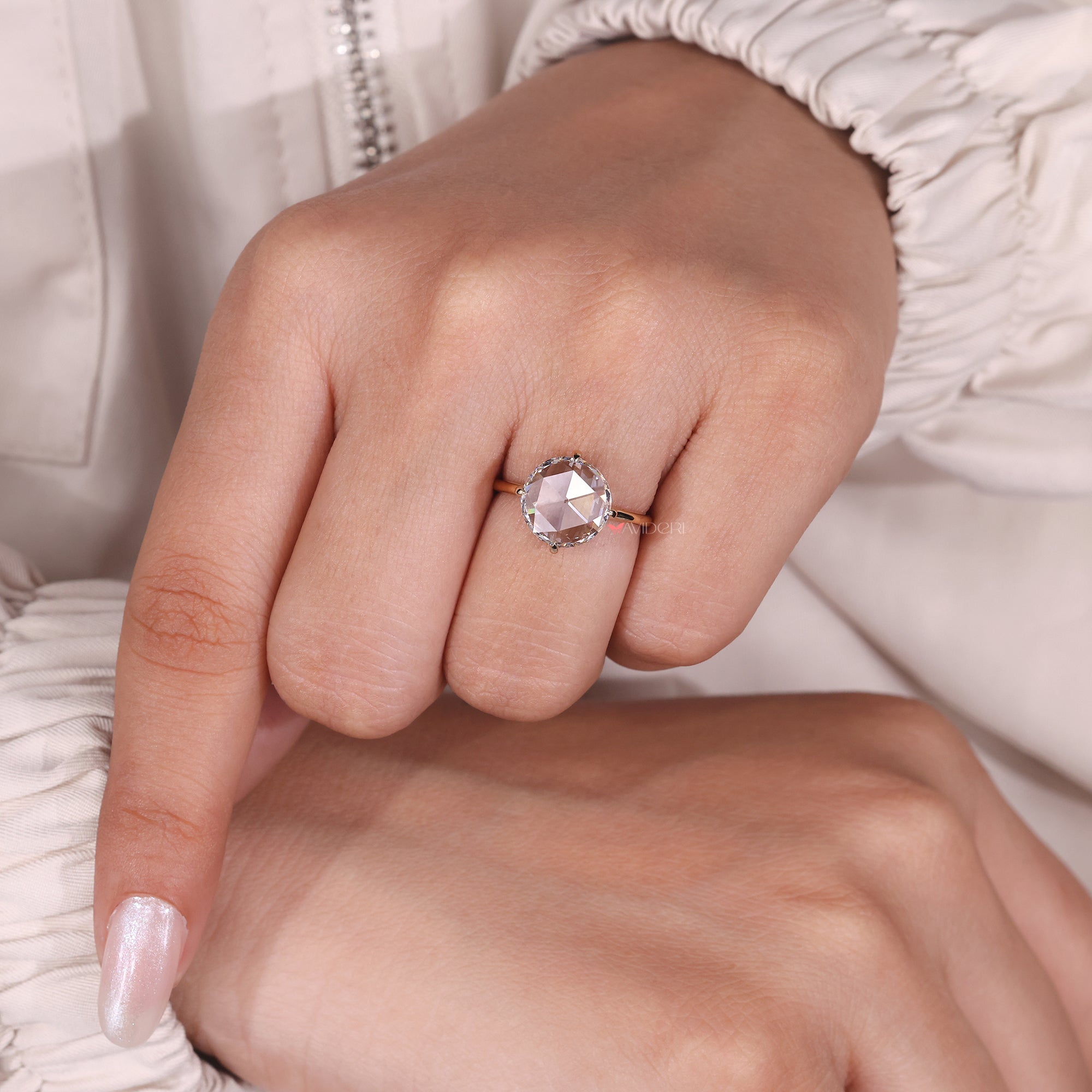 Round rose cut diamond ring featuring a sleek and modern design, perfect for any occasion.